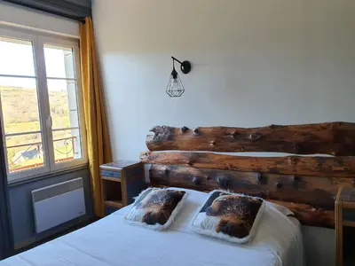 Un ou plusieurs lits dans un hébergement de l'établissement Grand Hotel de la Vallée