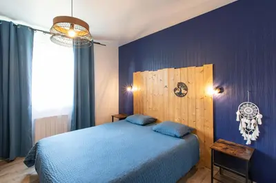 Un ou plusieurs lits dans un hébergement de l'établissement Gîte Jean Scafer, Piscine chauffée, Wifi, Salle de jeux, Animaux de la ferme