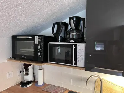 Cuisine ou kitchenette dans l'établissement les cristallines