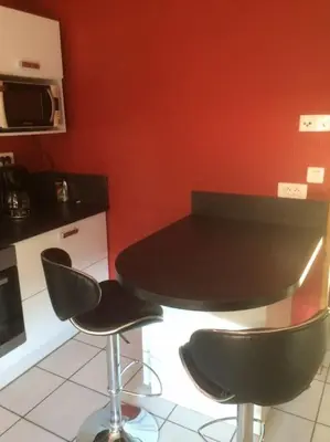 Cuisine ou kitchenette dans l'établissement Le Coin Tranquille au pied du Puy de Dôme