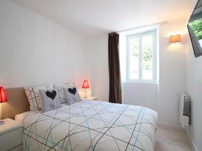 Un ou plusieurs lits dans un hébergement de l'établissement T3 Duplex au Centre du Mont-Dore avec Wifi, 5 Pers. - FR-1-608-217