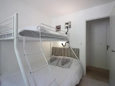 Un ou plusieurs lits dans un hébergement de l'établissement T3 Duplex au Centre du Mont-Dore avec Wifi, 5 Pers. - FR-1-608-217