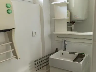 Salle de bains dans l'établissement Appartement Mont Dore face aux Thermes - Centre