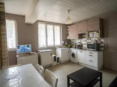 Cuisine ou kitchenette dans l'établissement Appartement Mont Dore face aux Thermes - Centre