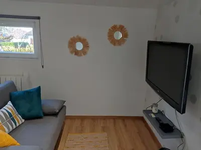 Télévision ou salle de divertissement dans l'établissement L alouette