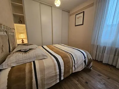 Un ou plusieurs lits dans un hébergement de l'établissement Maison spacieuse en Dordogne avec terrasse et jardin, animaux acceptés - FR-1-616-220