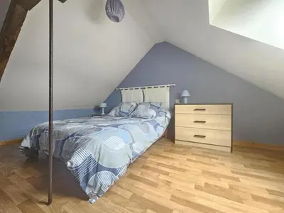Un ou plusieurs lits dans un hébergement de l'établissement Maison spacieuse en Dordogne avec terrasse et jardin, animaux acceptés - FR-1-616-220