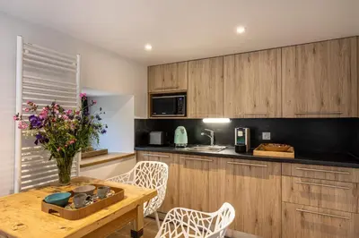 Cuisine ou kitchenette dans l'établissement Chez Mimi - La Petite Tour