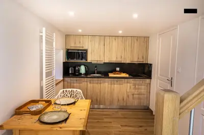 Cuisine ou kitchenette dans l'établissement Chez Mimi - La Petite Tour