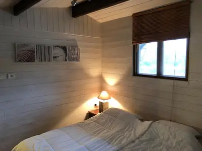 Un ou plusieurs lits dans un hébergement de l'établissement Le bon chemin Studio Stockholm