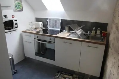 Cuisine ou kitchenette dans l'établissement gite de la rue droite