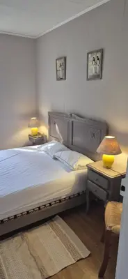 Un ou plusieurs lits dans un hébergement de l'établissement maison d'hôte, gîte, la maisonnette