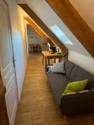 Coin salon dans l'établissement La ferme de la truffe chambres d hôtes