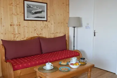 Coin salon dans l'établissement Grand studio 6 pers. Super Besse, Résidence ***