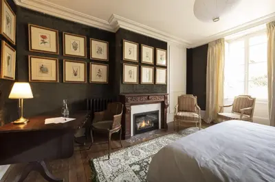 Un ou plusieurs lits dans un hébergement de l'établissement Hôtel de Colbert