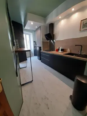 Cuisine ou kitchenette dans l'établissement Tulle Centre : grand et bel appartement