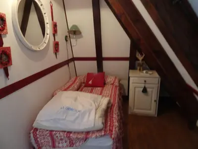 Un ou plusieurs lits dans un hébergement de l'établissement Chalet avec vue panoramique sur le Plomb du Cantal