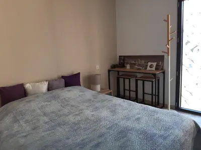 Un ou plusieurs lits dans un hébergement de l'établissement La grande Maison