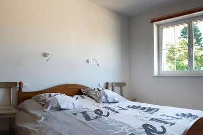 Un ou plusieurs lits dans un hébergement de l'établissement Villa neuve avec piscine 6 personnes en limousin