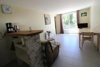 Télévision ou salle de divertissement dans l'établissement A la croisée des chemins