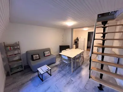 Coin salon dans l'établissement Appartement Duplex avec Wifi proche du centre