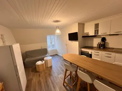 Cuisine ou kitchenette dans l'établissement Appartement Duplex avec Wifi proche du centre