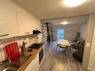 Cuisine ou kitchenette dans l'établissement Appartement Duplex avec Wifi proche du centre