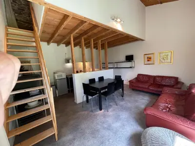 Coin salon dans l'établissement Dordogne et Corrèze vacances - Gites