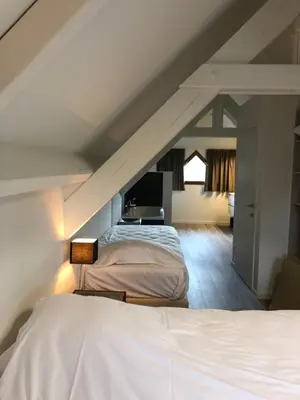 Un ou plusieurs lits dans un hébergement de l'établissement Le Lac Bleu huis 17