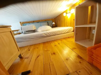 Un ou plusieurs lits dans un hébergement de l'établissement Studio 2 à 4 personnes avec garage privé