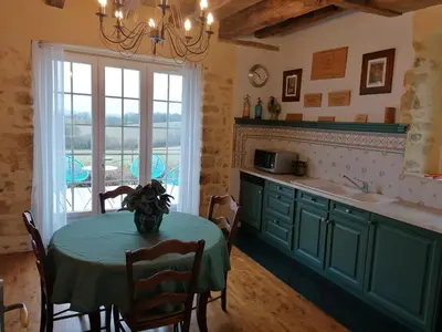Cuisine ou kitchenette dans l'établissement Gite de la Tuilière