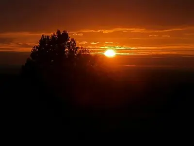 Lever ou coucher de soleil vu de la maison de vacances ou à proximité