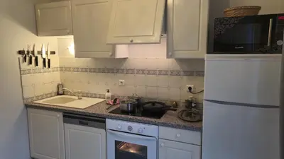 Cuisine ou kitchenette dans l'établissement St Nectaire- Appartement Terrasse Privée- 4 personnes