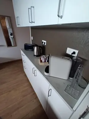 Cuisine ou kitchenette dans l'établissement STUDIO DE LA BICHETTE