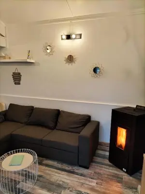 Coin salon dans l'établissement Au bord du lac