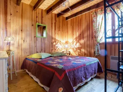 Un ou plusieurs lits dans un hébergement de l'établissement Holiday Home L'Aubépine by Interhome