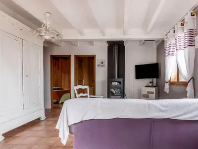 Télévision ou salle de divertissement dans l'établissement Holiday Home L'Aubépine by Interhome