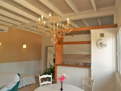 Coin salon dans l'établissement Holiday Home L'Orme by Interhome