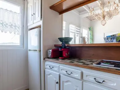 Cuisine ou kitchenette dans l'établissement Holiday Home L'Orme by Interhome
