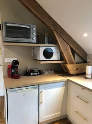 Cuisine ou kitchenette dans l'établissement Logement à Brive, près du centre-ville et de la gare - Climatisation, fibre internet et stationnement gratuit
