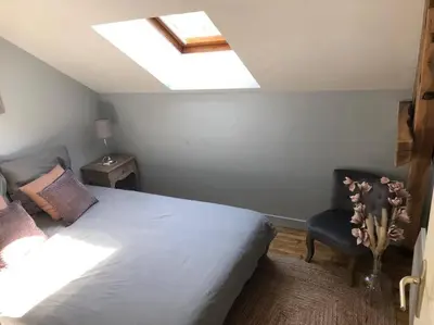 Un ou plusieurs lits dans un hébergement de l'établissement Logement à Brive, près du centre-ville et de la gare - Climatisation, fibre internet et stationnement gratuit