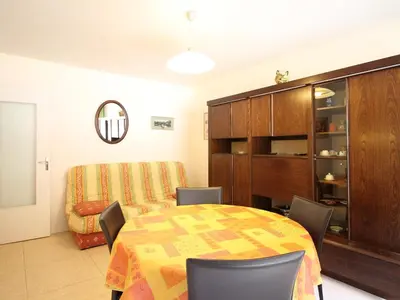 Coin salon dans l'établissement T2 avec Balcon et Parking Privatif au Mont-Dore - FR-1-608-212