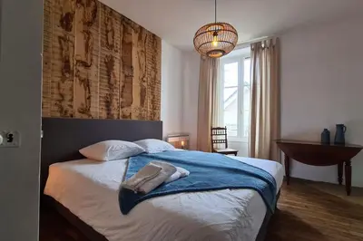 Un ou plusieurs lits dans un hébergement de l'établissement Charming and comfortable house