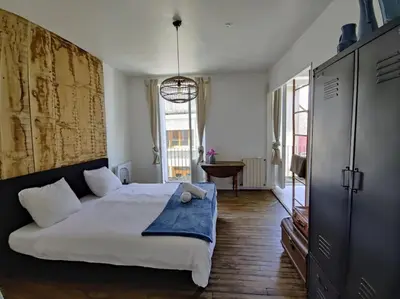 Un ou plusieurs lits dans un hébergement de l'établissement Charming and comfortable house