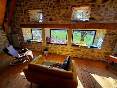 Coin salon dans l'établissement La Grange Aux Frênes -Gîte 6 Personnes- Tranquillité, Nature et Confort