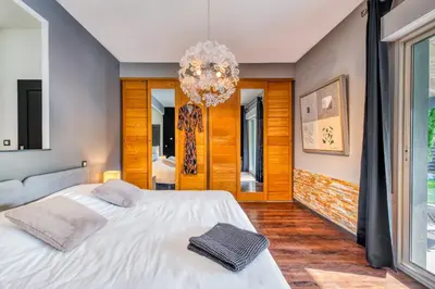 Un ou plusieurs lits dans un hébergement de l'établissement Villa 'La Crabichonnière'