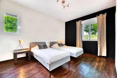 Un ou plusieurs lits dans un hébergement de l'établissement Villa 'La Crabichonnière'