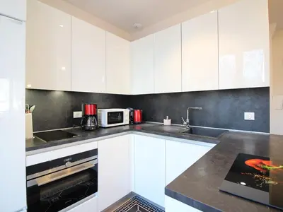 Cuisine ou kitchenette dans l'établissement T3 à La Bourboule avec parking et WiFi - Idéal pour 4 personnes - FR-1-608-226