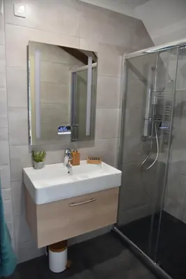Salle de bains dans l'établissement Au Relais de Laborde