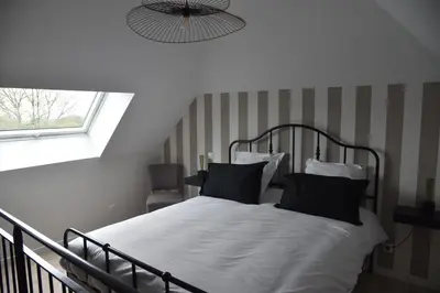 Un ou plusieurs lits dans un hébergement de l'établissement Au Relais de Laborde